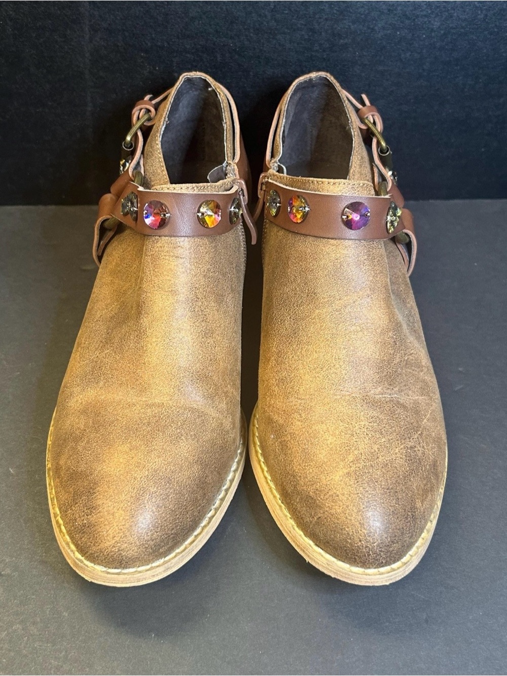 Woman’s Brown Leather Slip-On Boots with Decorative Gem Strap